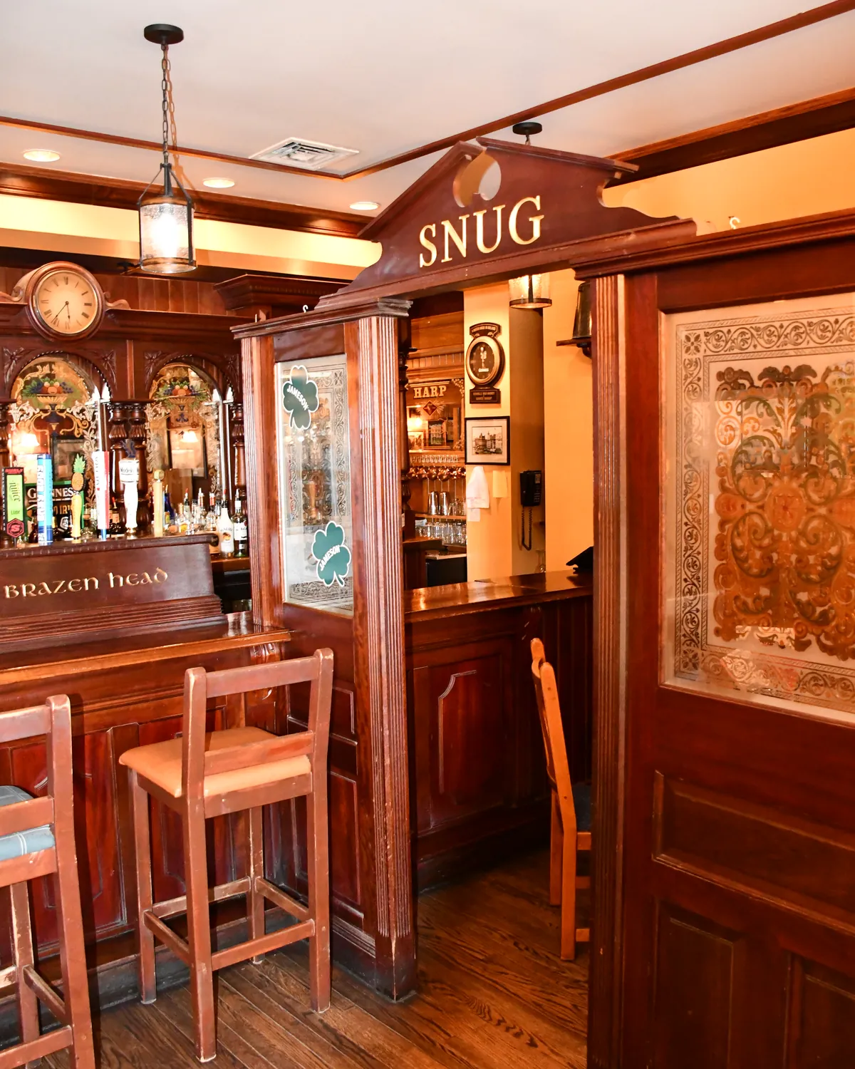 The carved wooden entrance to the Snug inside Brazen Head