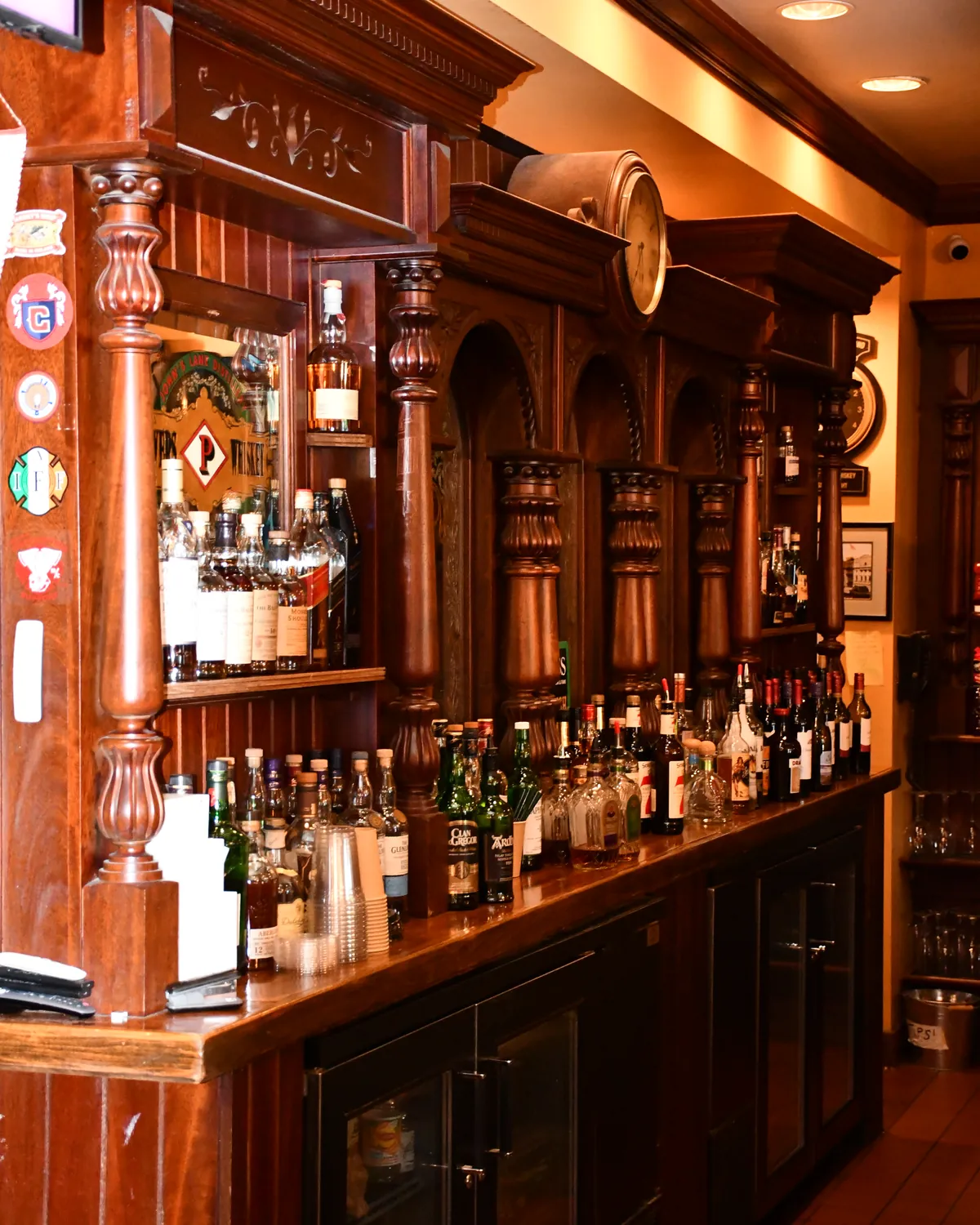 Hand-carved woodwork and bottles along the Brazen Head back bar
